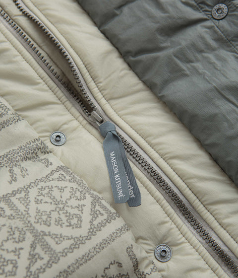 and wander x Maison Kitsune Nordic Border Insulation Jacket in Light Beige