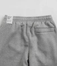Nike Club Fleece Joggers in Dark Grey Heather and Matte Silver / White thumbnail
