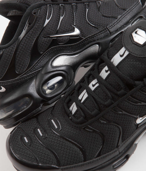 Nike Air Max Plus Shoes in Black and Metallic Silver