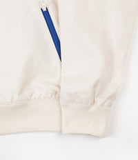Nike Windrunner Jacket in Light Cream and University Red / White thumbnail