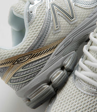 New Balance 860 Shoes - Sea Salt / Gold Metallic thumbnail