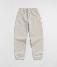 Nike ACG Tuff Fleece Lungs Pants - Light Orewood Brown / Hyper Crimson thumbnail