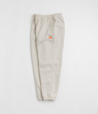 Nike ACG Tuff Fleece Lungs Pants - Light Orewood Brown / Hyper Crimson thumbnail