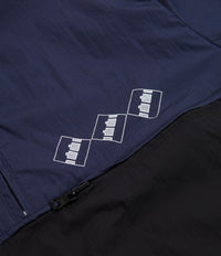 The Trilogy Tapes Packable Festival Jacket - Navy / Black thumbnail