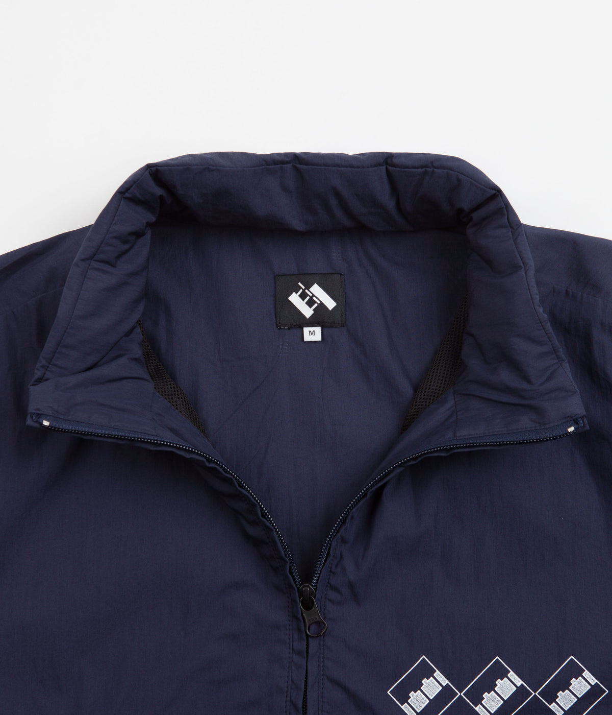 The Trilogy Tapes Packable Festival Jacket - Navy / Black | Always in ...