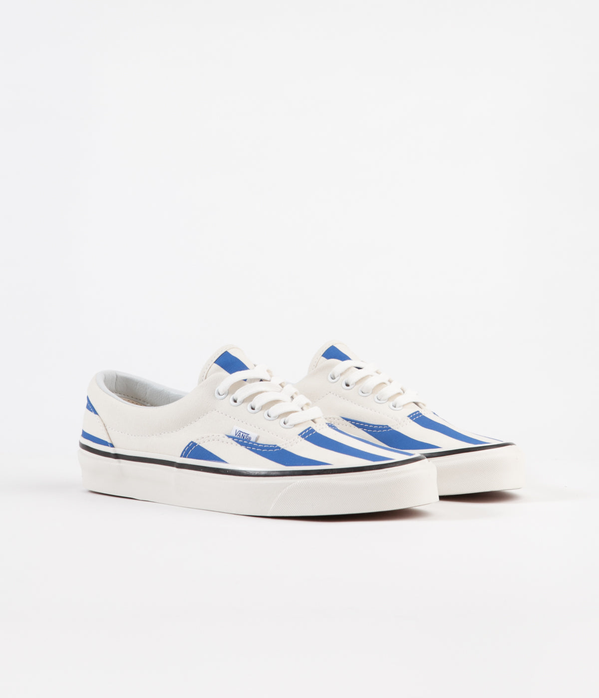 Vans white store and blue stripe